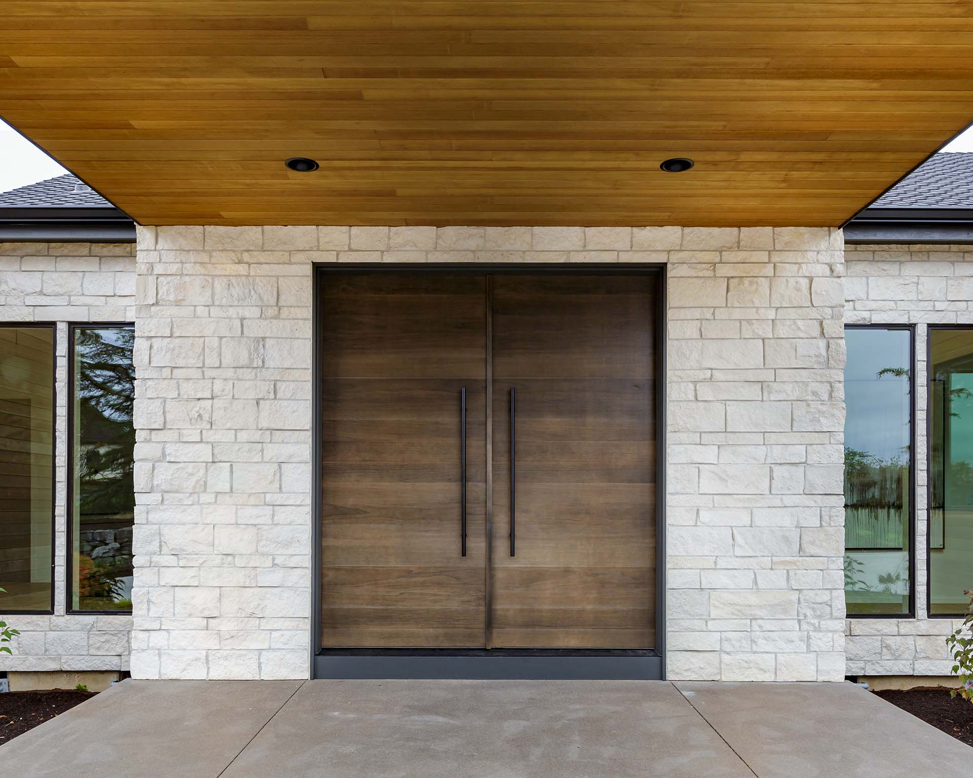 Natural Cream Limestone Veneer on Residential Entryway Exterior