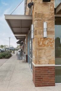 Natural Mixed Sandstone Veneer on Commercial Property Exterior - Detail